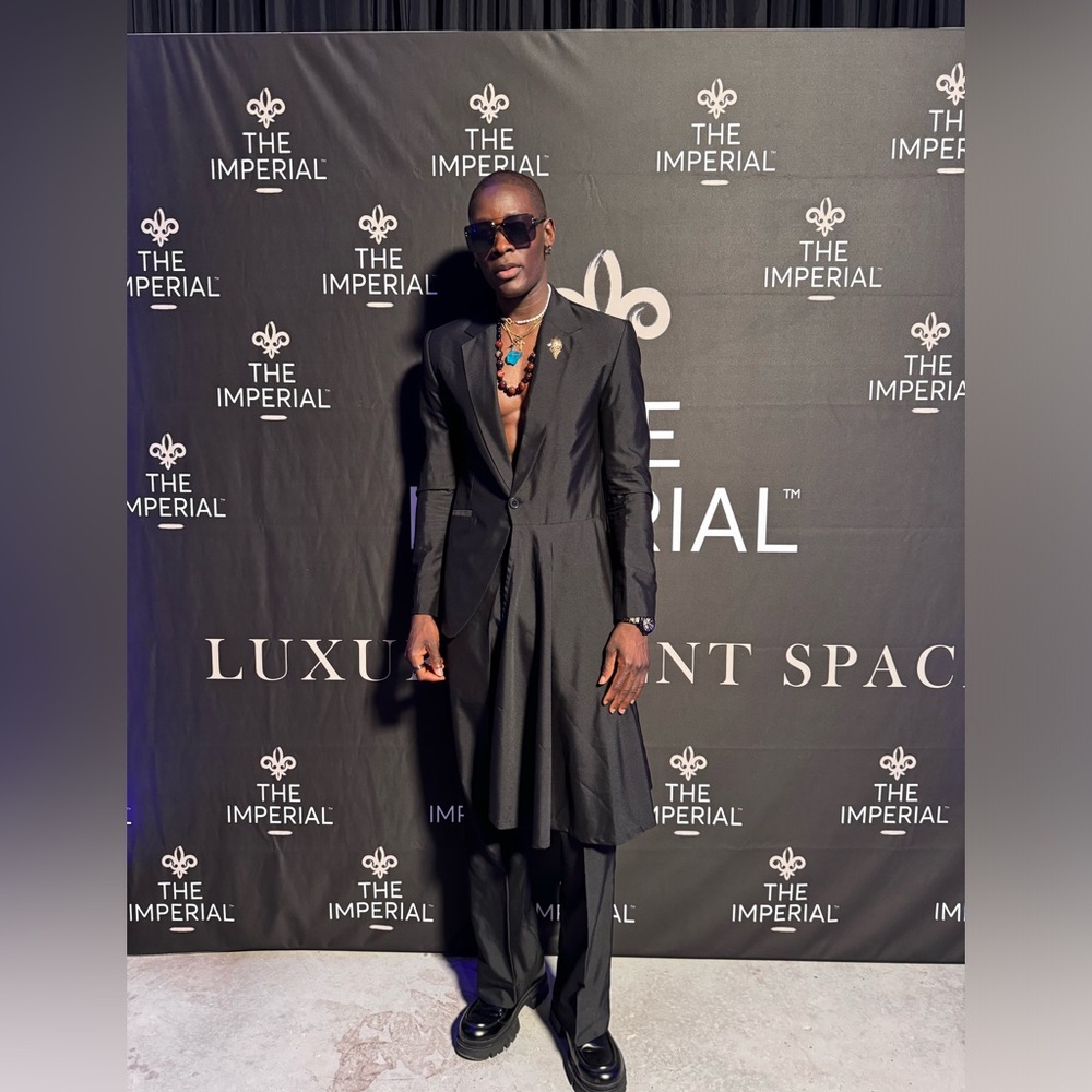 A custom made suit with the flare pant made for me, worn ones.